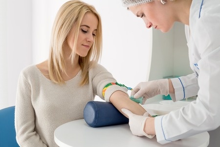 Women getting health exam for prediabetes checkup